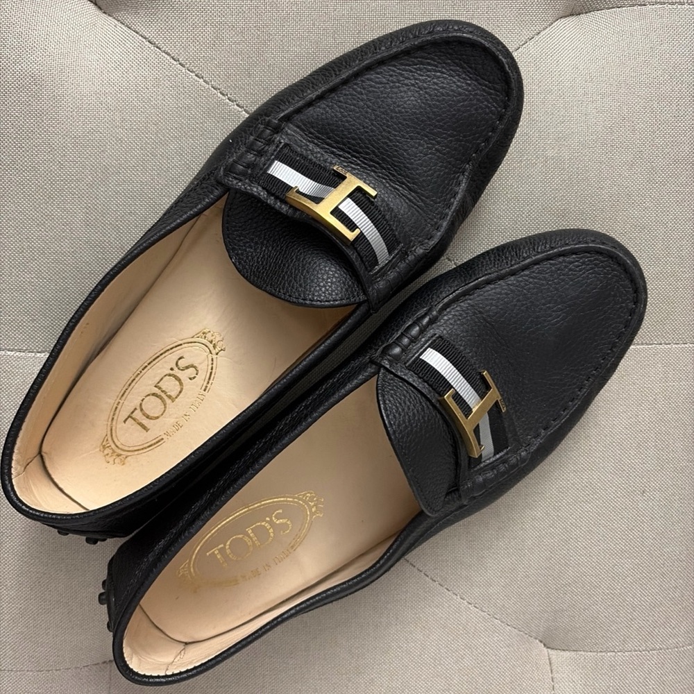 Tod's Black Leather Loafers with Gold Accent